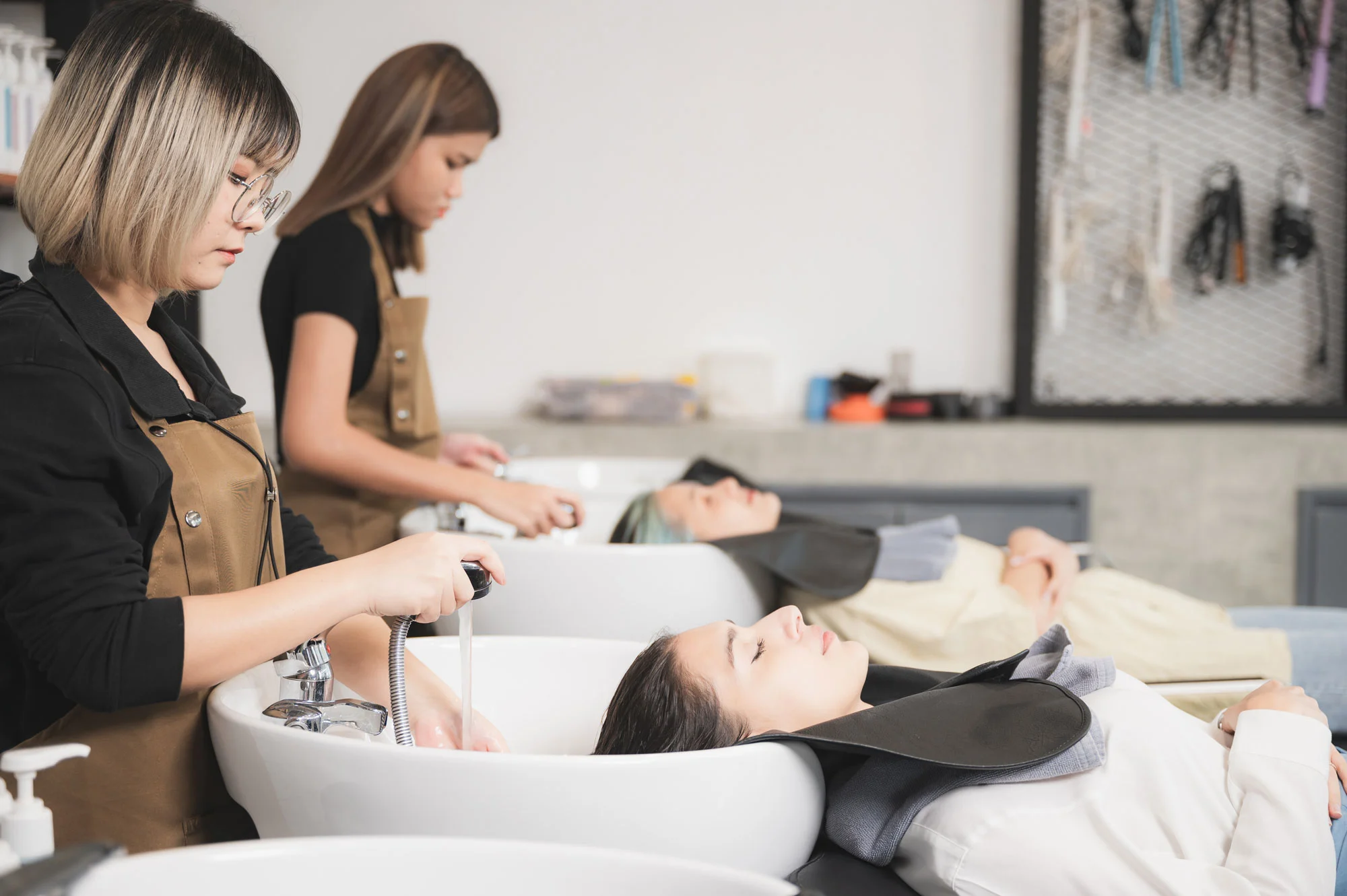 hairdresser-using-scissor-cut-client-s-hair-hairs-2023-11-27-05-13-57-utc2.webp